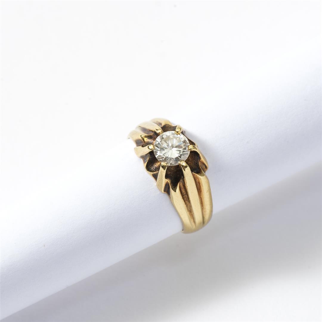 An 18 carat gold cocktail ring Late 20th century Set with 18 oval faceted...
