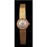 Omega dames polshorloge aan gouden band,18-krt., handwinder, kastmaat is 19 mm, uurwerknummer 24096035, prductiejaar 1966,16,5 cm lang, bruto 29,8… – kavel bij Veilinghuis Derksen
